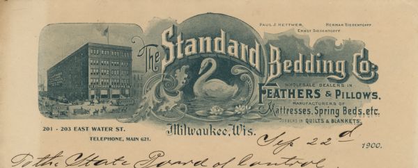 Letterhead of the Standard Bedding Company, with a three-quarter view of the company building and a roundel with decorative flourishes that features a swan and lotus flowers.