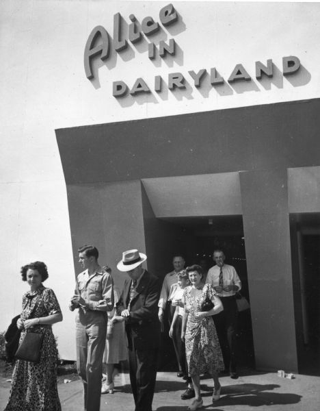 A small crowd leaves the "Alice In Dairyland" building at the Wisconsin Centennial Exposition at the State Fair Park.