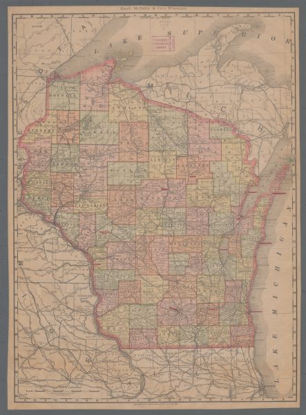 A cloth mounted, hand-colored map of Wisconsin showing the rail routes, counties, cities, towns, rivers and lakes in the state. The map also shows eastern Minnesota and Iowa, northern Illinois, and the western most part of Michigan’s Upper Peninsula.