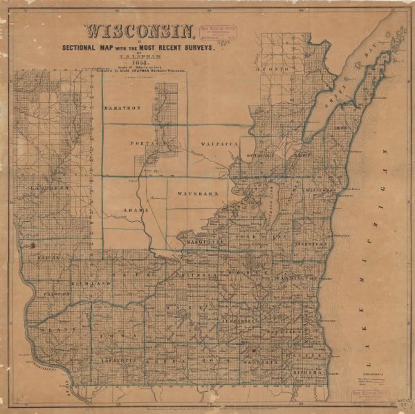 Map outlines mid and southern Wisconsin county boundaries in blue, and city/town lines are provided. Other marks include mines, plank roads, and railroads.