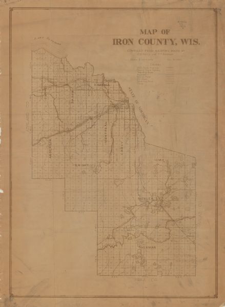 A map of Iron County, Wisconsin, shows sections and the towns of Upson, Hurley, Hamilton, Saxon, and Mercer, lakes and streams, villages, railroads, roads and trunk highways, trails, and the Lac Du Flambeau and La Pointe Indian reservations.