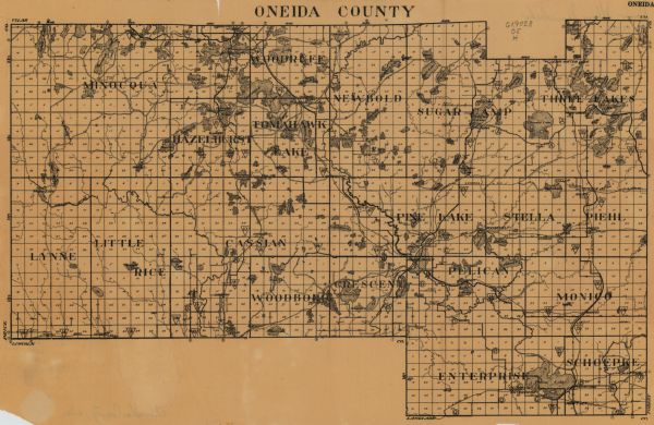 This map from the early to mid-20th century shows the township and range system, towns, cities and villages, roads, railroads, schools, churches, and lakes and streams in Oneida County, Wisconsin.