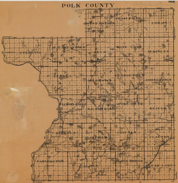 This map of Polk County, Wisconsin, from the first half of the 20th century, shows the township and range grid, towns, sections, villages, roads, railroads, schools, churches, cemeteries, town halls, creameries, and rivers and streams. 
