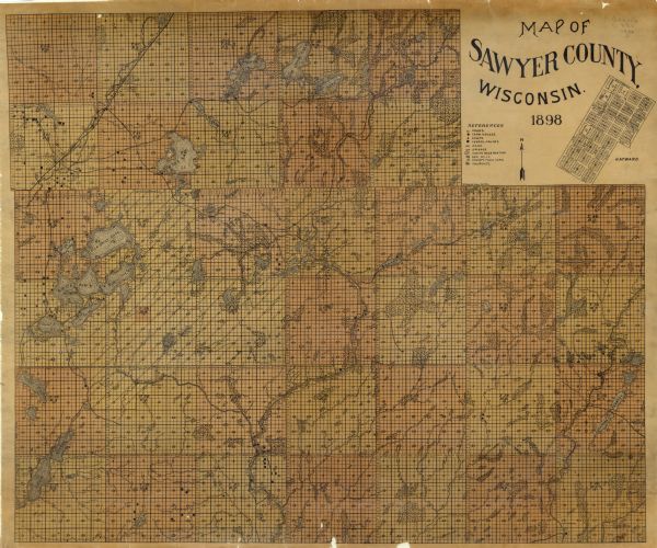 This 1898 map of Sawyer County, Wisconsin, shows the township and range system, sections, roads, farm houses, camps, school houses, dams, bridges, Indian reservation, saw mills, county poor farm, churches, and wetlands, lakes and streams. An inset map of Hayward is also shown.