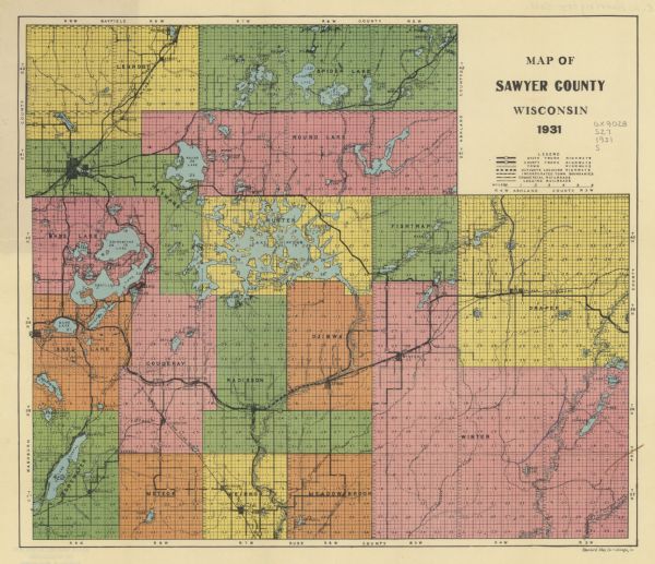 This 1931 map of Sawyer County, Wisconsin, shows the township and range system, towns, sections, cities and villages, railroads, highways and roads, and lakes and streams.