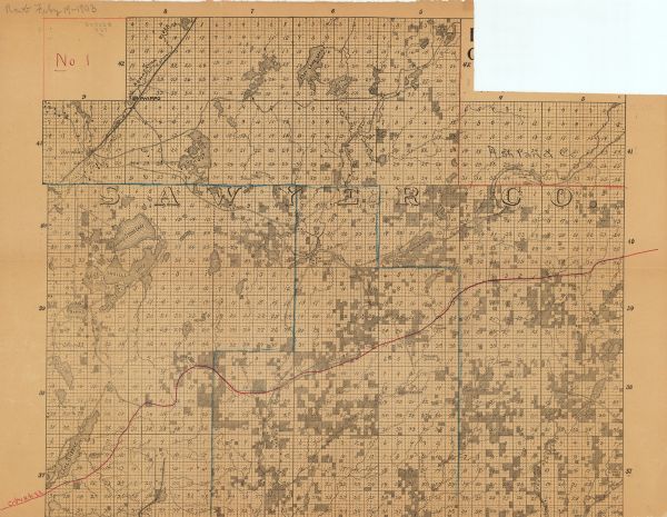 This map shows the township and range system, sections, dam locations, railroads, roads, selected buildings, and lakes and streams in Sawyer County, Wisconsin, as well as the southwestern corner of Ashland County. Color manuscript annotations indicate the route of the Chicago and North Western Railroad and some boundary lines. The title area and lower section of the map are missing.