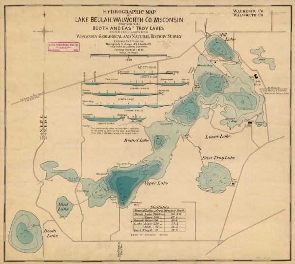 This map shows the contour depths of Lake Beulah, Booth Lake, and Army Lake (labeled East Troy Lake on the map) in Walworth County, Wisconsin, and includes five cross sections of Lake Beulah. Roads and hotels in the area are shown and a table provides acreage and depths for the three lakes.