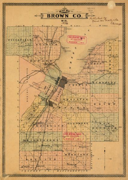 This map of Brown County, Wisconsin, from the late 19th century shows land claims along the Fox River, the township and range grid, towns, sections, cities, villages and post offices, schools, churches, saw mills, and other buildings, roads, railroads, the Oneida Reservation, and rivers and streams.