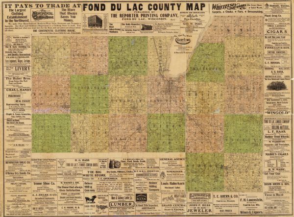 Map shows townships and sections, landownership and acreages, roads and railroads, and selected buildings. "1904" inscribed on map in pen. Includes business advertisements.