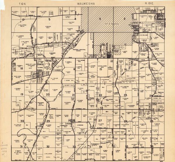 Map shows landownership and acreages, roads, and railroads in the Town of Waukesha and part of the city of Waukesha, Waukesha County, Wisconsin.