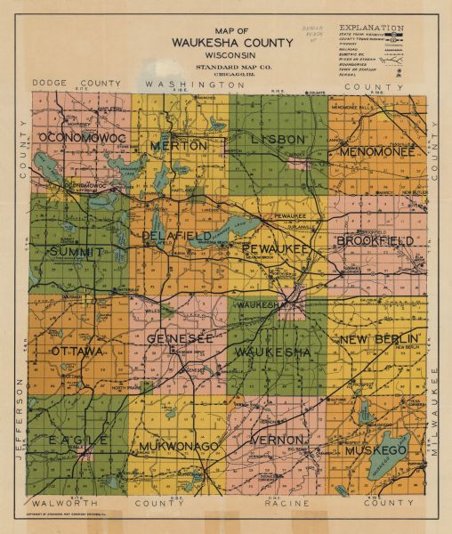 This map of Waukesha County, Wisconsin, from the 1930s shows the township and range grid, towns, sections, cities and villages, highways and roads, railroads and electric railways, schools, and lakes and streams.