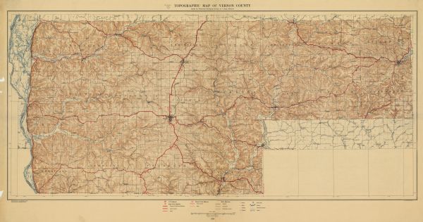 This 1928 topographic map of Vernon County, Wisconsin, shows relief, lakes, streams and wetlands, the township and range grid, sections, cities and villages, roads, railroads, schools, churches, rural buildings, cemeteries, and bench marks.