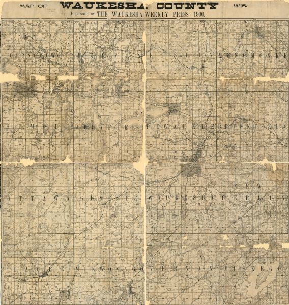 This 1900 map of Waukesha County, Wisconsin, shows the township and range grid, towns, sections, cities and villages, rural landowners and acreages, railroads, roads, schools, churches, and lakes and streams. 
