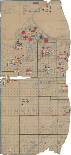 This World War I era map fragment depicting the western portion of Douglas County, Wisconsin, includes manuscript annotations and stickers pasted onto the official county highway map showing YMCA, K of C, Red Cross, Liberty Loan, War Savings Stamps, County and Town Councils of Defence, and other miscellaneous information. The right side of the map is torn off.