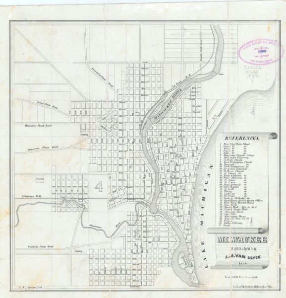 Reproduction printed on glossy, cloth-backed paper. Right side includes "References," or points of interest that correspond to numbers on the map. Running east to west the streets begin with "North" and end with "Plank Road." Streets north to south begin with "16th" and end with "Elizabeth." The "Milwaukee River" and "Menomonee River" are labeled as are the railroads.