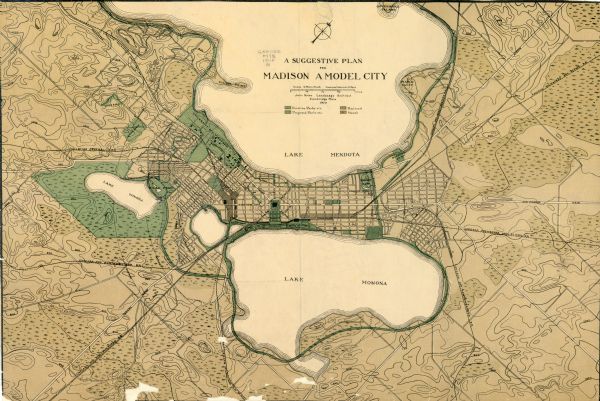 Shows existing and proposed parks, railroads, and marshes in a color coded key. "Contour interval 20 feet." Lake Wingra, Lake Mendota, and Lake Monona are labelled.