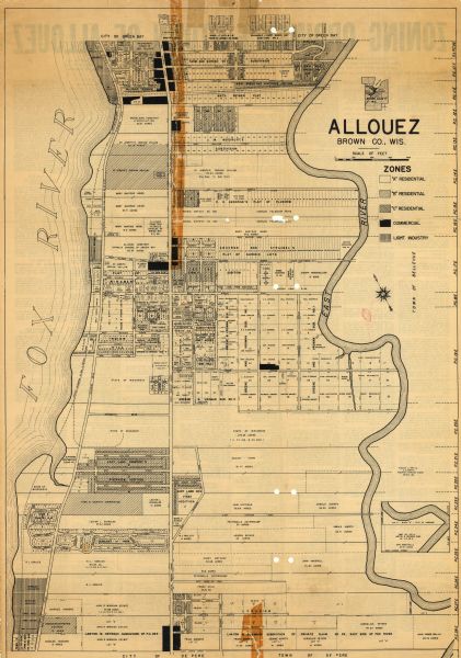 Map shows land ownership, residential zones, commercial zones, and light industrial zones. Includes inset and location map. Also includes zoning ordinance for the town of Allouez on the back of the map. The back of the map reads: "Adopted the 7th day of July, 1947."