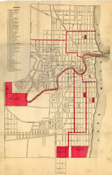Map shows location of government buildings, schools, churches, parks, and other points of interest. The upper left hand margin features a "Reference" section. In red is a "fire alarm guide" for the city of Racine.