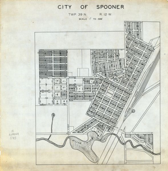 This map is ink on tracing paper and shows the city of Spooner. The map shows numbered plats, labeled streets, and the Yellow River.