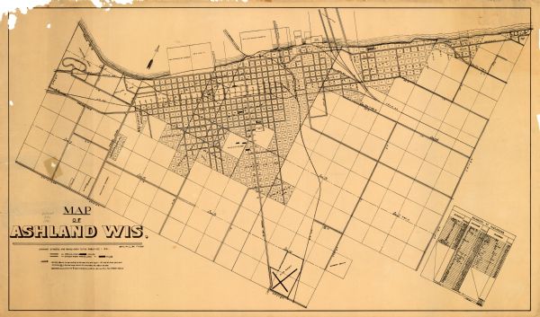 This map of Ashland shows roads, railroads, and local businesses. The map reads: "Showing streets and roads open to the public Oct. 1, 1931." Included on the map is a distance chart.