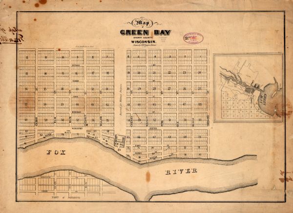 This map of Green Bay shows plat of the town, lots by number, local streets, the military Fort Howard, part of Fox River and part of Navarino. The map features an inset map.