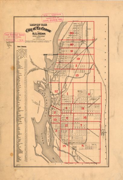This map of La Crosse shows city ward boundaries in red, streets, railroads, cemeteries, Grand station crossing, the road to French Island, depots, Lake Park, Inter-State Fair Grounds, Trotting Park, and the Mississippi River. Below the title the map reads:" Entered according to Act of Congress in the year 1893 in the Office of Library of Congress." The left margin of the map includes a street index.