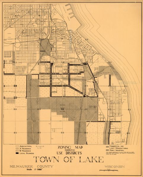 This map of the Town of Lake is ink and pencil on paper and shows lots and acreages, reserved land, and public squares. The bottom of the map includes a key of land use: agricultural, residential, local business, commercial, and light and heavy industrial. The Town of Lake was a town in Milwaukee County from January 2, 1838 to April 6, 1954.