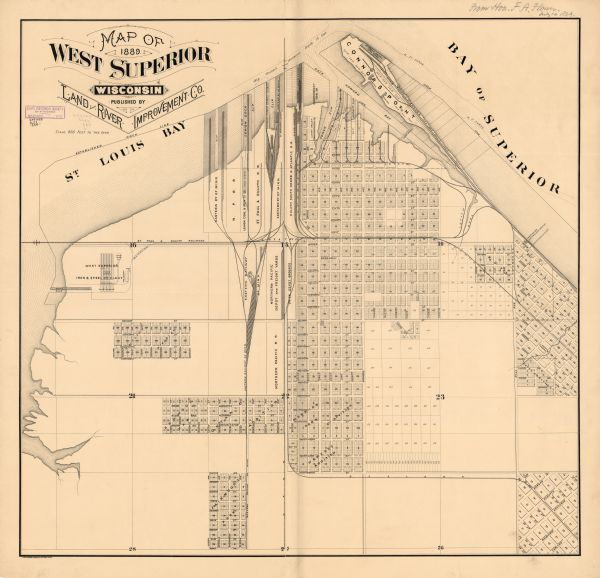 This map shows lot and block numbers, established dock lines, docks, slips, railroads, and streets of West Superior in 1889.