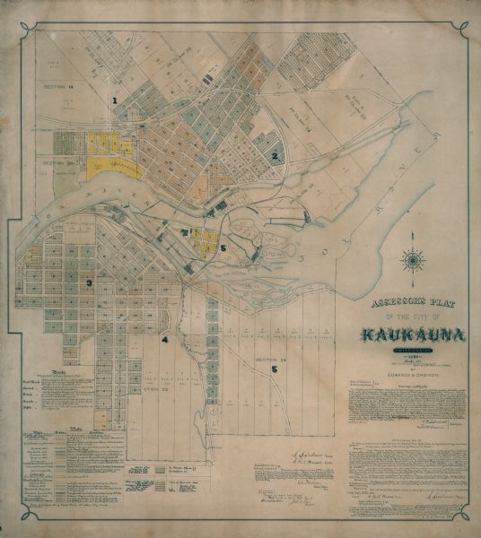 This map shows a plat of the city, wards, lots, local streets, roads, railroads, buildings, parks, and part of Fox River. The map includes tables for plat and ward descriptions. Various ward are shown in yellow, pink, blue, green, and orange.