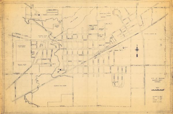 The map shows streets, wells, school land, parks, cemeteries, railroads, and the Delbrook Golf Course. The bottom of the map reads: "January 11, 1962 May 20, 1962 November 1, 1965 January 11, 1966." The map is a blue line print.