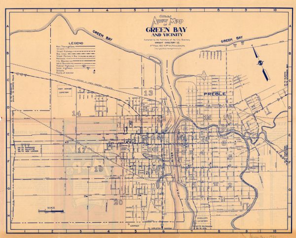 This map shows streets and highways, street car and bus lines, railroads, depots, schools, wards, and points of interest. The map is oriented with the north to upper left. The cover of the map features a street guide and index of points of interest and schools.