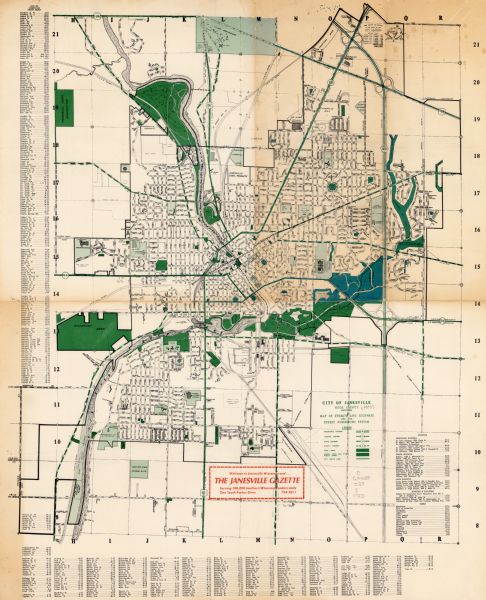 This map includes an index of streets and schools and also shows parks, schools and public lands, and industrial sites. Portions of the map are in green and blue. 	