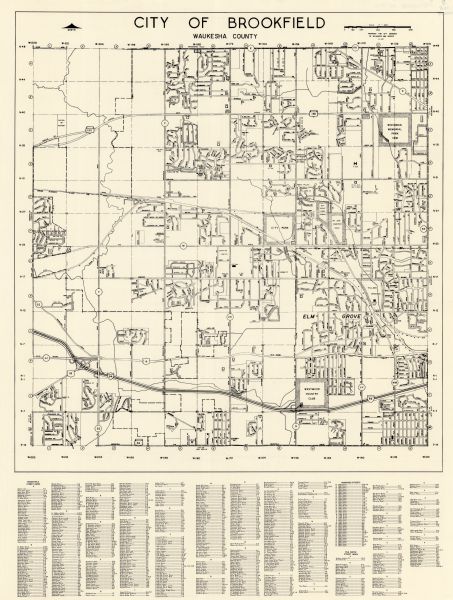 This basic street map shows roads, schools, parks and cemeteries and includes a street index in the lower margin. The map also shows a portion of Elm Grove, Wisconsin.