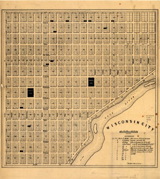 This is a cadastral map and shows proposed lot and block numbers for a paper city on the banks of the Rock River. Also shown are two public squares and some lots marked in black.