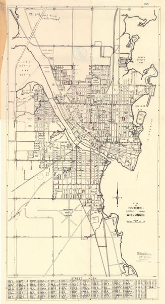 This map shows streets, points of interest, Lake Winnebago, Millers Bay, South Asylum Bay, Lake Butte des Morts, and the Fox River. The map also includes a street index. Ward numbers are handwritten in red ink.
