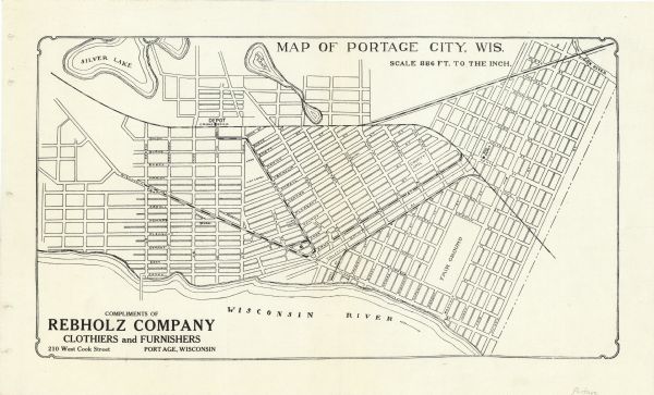 This street map was likely given out by the Rebholz Company: Clothiers and Furnishers. The map shows labeled streets, train tracks, Silver Lake, Mud Lake, and the Wisconsin River.