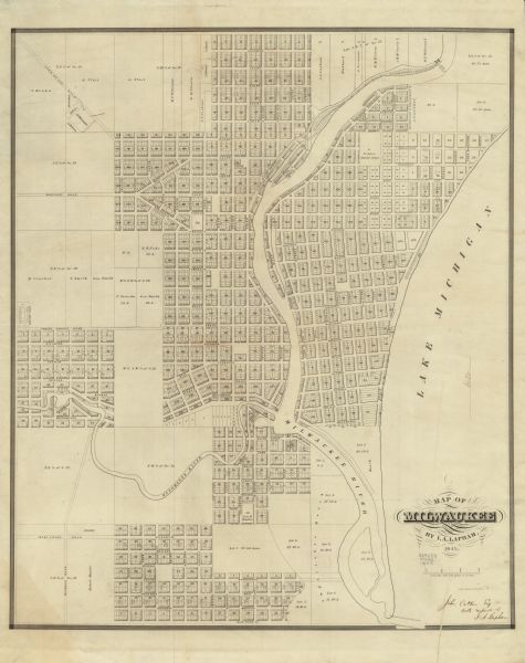 This map shows lot and block numbers, local streets, railroads, some landowners’ names, Milwaukee River, Menomonee River, and part of Lake Michigan. The map includes manuscript annotation: "2d impression."