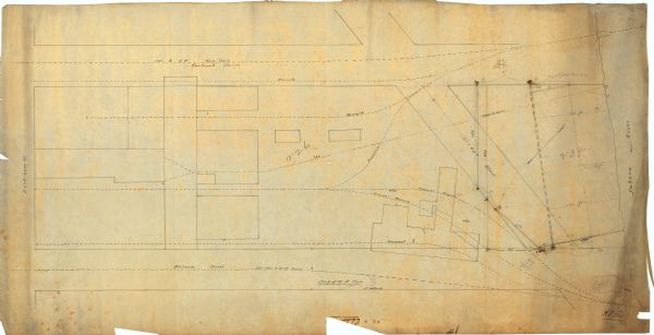 This maps is pen and pencil on tracing cloth and shows local streets, buildings, proposed and present branches of railroad track, and sewer and water lines. The lower right margin reads: "A.O. Fox."