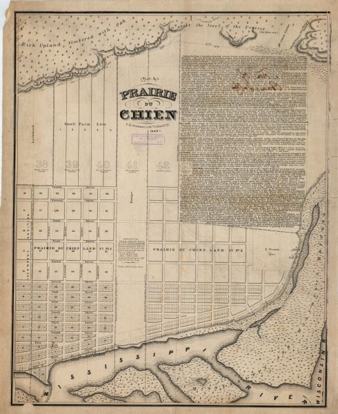 This map is a development plat that shows street names, numbered blocks and lots, and small farm lot owners. Included on the right of the map is a large amount of text describing the land, the Mississippi River and the Wisconsin River. Relief is shown by hachures.