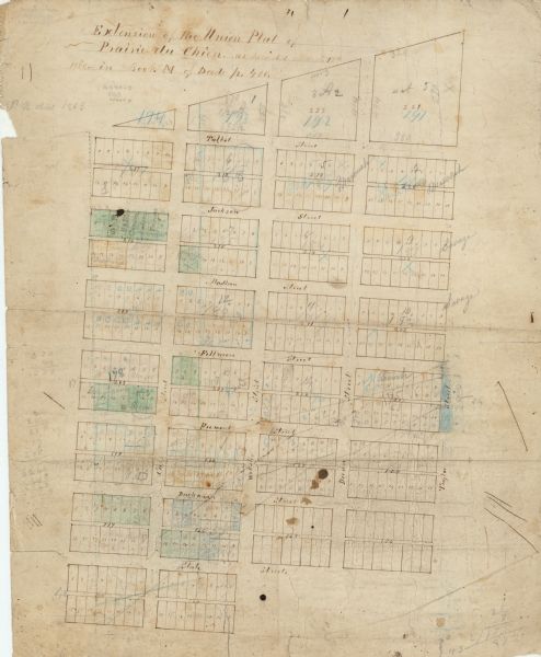 This map shows streets, lots, and landownership. Also included are notations in pencil and blue colored pencil. Some lots are colored in blue, green, or brown. The top of the map reads: "Extension of the Union Plat of Prairie du Chien. As recorded March 13th 1858 in Book M of Deeds n. 400."