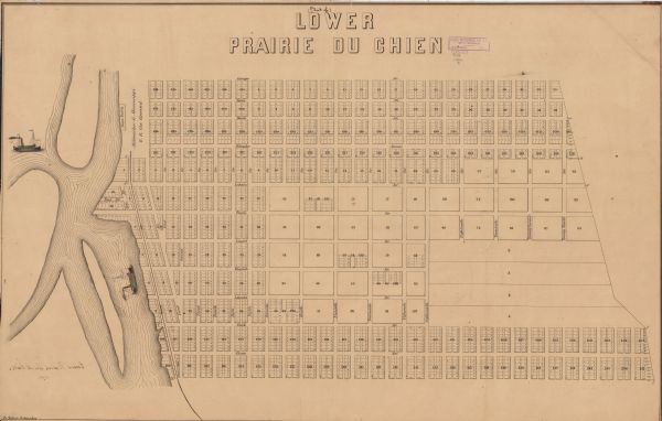 This map shows lot and block numbers, streets, depot building, and the Milwaukee & Mississippi Rail Road.