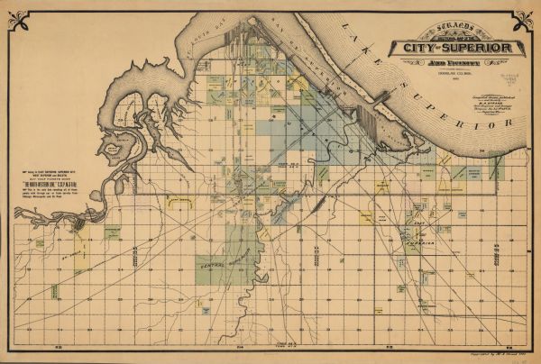 This map shows the St. Louis Bay, Lake Superior, railroads, railroad yards, main roads, additions, and selected buildings in Superior and parts of the Towns of Superior, Parkland, and Lakeside.  Also included is an advertisement for the North-Western Line, C.St.P.M. & O. Ry. on the left margin.

