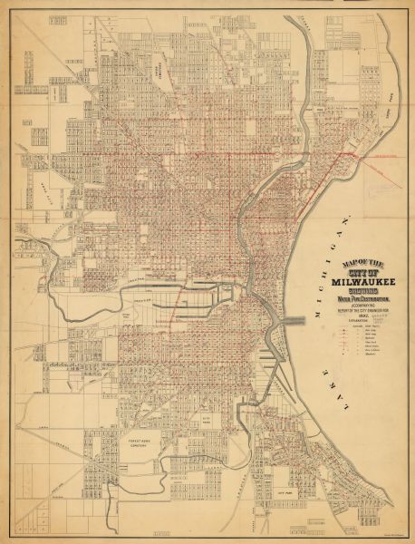 This map shows water pipes, hydrants, stop cocks, check valves, fire cysterns, and manholes. Also shown are block numbers, streets, railroads, parks, cemeteries, and Lake Michigan.