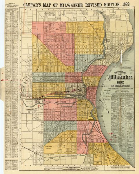 This map shows schools, engine houses, railroads, street railways, wards, parks, cemeteries, block numbers, a street index, explanations, and general references. Also included are manuscript annotations in black and red ink regarding railroads and depots.