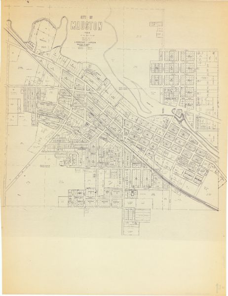 This blue line print map shows lot and block numbers and dimensions, additions, and some landownership. The Lawrence River is labeled.