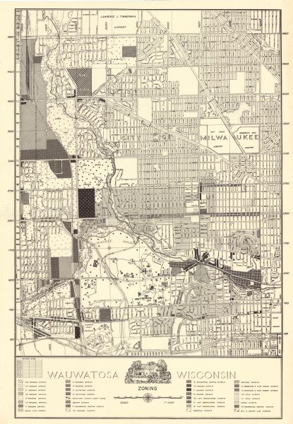 This map shows 32 zoning districts, house numbering system, parks, cemeteries, and Milwaukee County institutional buildings.
