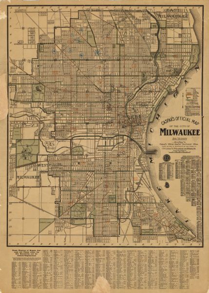 This map shows ward numbers, streets, railroads, electric car lines, parks, steam railways, section numbers, rivers, Lake Michigan, churches, schools, and other places of interest. Also included is an index of general references and streets and a key of explanations.  Cemeteries and parks are illustrated in green. Ward numbers and electric car lines are illustrated in orange. Some annotations are in blue ink. The right margin reads: "Copyright 1916 by C.N. Caspar Co."