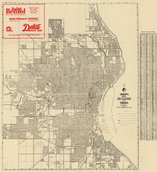 This map shows streets, railroads, parks, cemeteries, and a proposed harbor. The top margin includes an advertisement for Delco Motor Oil and the right margin includes a city street guide. Also included are colored manuscript annotations showing new railway facilities, proposed subway, proposed street changes, and discontinued railway facilities.