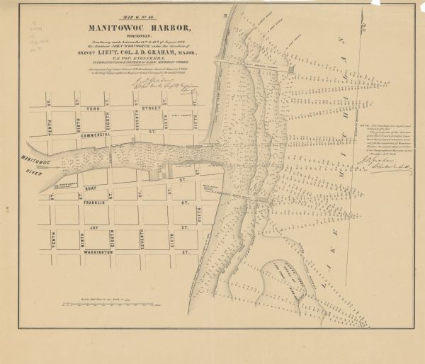 This map shows streets, piers, and wharves.  Lake Michigan, the Manitowoc River, and select buildings are labeled. Relief is shown by hachures and soundings are in feet and decimals of a foot.  The right margin includes notes on soundings and piers. The top margin reads: "Map G. No. 46."
