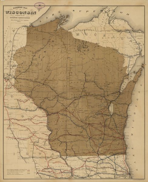 This map shows railroads by operator and projected railroads. Eastern Minnesota, the upper peninsula of Michigan, northeastern Iowa, and northern Illinois are also covered. Counties, Lake Michigan, Lake Superior, and Lake Winnebago are labeled.
